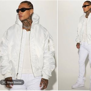 White bomber jacket w/ hood. Super dope comes brand new with tags. Never worn.